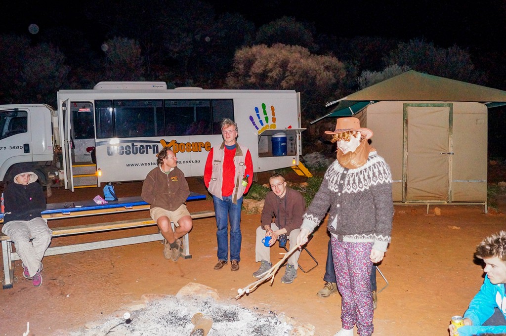 Tour Group Building a Campfire in Australia